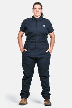 Womens Short Sleeve Hadley Coveralls Straight leg. Looking good. Belt loops + adjustable waistband. Cinch up. Reinforced front pockets. Double down. Pass-thru zips. Dig deep. Locker loop. Hang ‘em up. Tool loop. Hammer Time. Crotch gusset. Free the squat. Articulated knee. Bend it. Reinforced knee. Don't blow it. Knee slot. Put a pad in it. Elastic cuffs. Keep out. The coveralls to end 'em all. Engine oil, grease, and dirt are no match for Faye Hadley, who works hard and gives her all to every c Fitted Utility Overalls With Pockets, Utility Jumpsuits And Rompers With Bib Front And Pockets, Utility Jumpsuit With Bib Front And Pockets, Utility Jumpsuits With Side Pockets And Bib Front, Fitted Overalls With Cargo Pockets, Utility Jumpsuits And Rompers With Pockets For Outdoor, Utility Style Bib Front Jumpsuits And Rompers For Work, Utility Jumpsuits/rompers With Side Pockets, Utility Style Jumpsuits And Rompers With Side Pockets