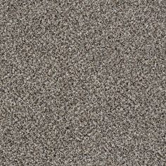 the texture of an old carpet is black and white, with small speckles