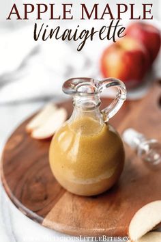 an apple cider is sitting on a cutting board