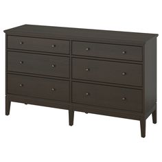 a dark brown dresser with six drawers