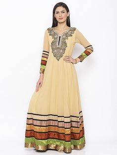 Beige Full Length Georgette Kalidaar Kurta.. Full Sleeves With Contrast Satin Borders And Brocade Detailings In Hemline And Sleeves..Hand Embroidery Of Pearls And Gold Zardozi On Neck Worn With Beige Cigarette Pants. Kalidaar Kurta, Party Wear Kurti, Party Wear Kurtis, Long Kurta, Western Dress