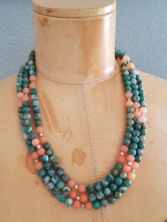 "Featuring this Triple Strand beaded necklace made using Sterling Silver Finding and hook clasp and round gemstones. The gemstones are Green with a White Matrix Jasper and Pinkish Orange Rose Quartz and are strung onto wire. The necklace has a cascading bib with 3 layers. The gemstones are cold to the touch are considered Semi-Precious Stones. The color combination is so appealing to the eye and would match just about any outfit. The necklace is heavy and constructed very sturdy. I believe that Jean Art, Nice Necklaces, 3 Layer Necklace, Semi Precious Necklace, Bead Creations, Pinkish Orange, Lucite Jewelry, Green Jasper, Stone Beaded Necklace