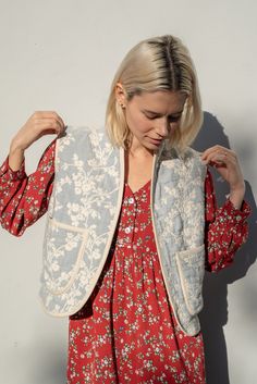 Our cotton jacquard of wispy cornflowers. Quilted and stonewashed for added softness. In shades of light cornflower blue & cream. Bound with handcut herringbone cotton binding. Cream ground floral lining. Front patch pockets 100% cotton textile, thread and batting All stitch-work, piecing, and fabric makes this coat unique Repurposed in Los Angeles, California Dry Clean only Crunchy Outfits, Light Cornflower Blue, Quilt Vest, Quilted Waistcoat, Quilted Clothing, Woman Vest, Stitch Work, She Is Clothed, Shades Of Light