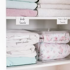 the shelves are filled with folded and unmade baby blankets, diapers, and other items