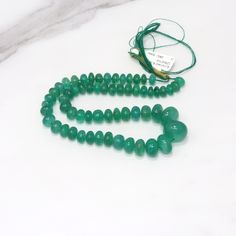 "Green Emerald 6.5mm - 13mm Smooth Rondelles 13\" Bead Strand Specifications: Gemstone: Green Emerald  Shape: Smooth Rondelles  Size: 6.5mm (6.5mm - 7.5mm) Strand Length: 13\" - 0.50\") Pieces per Strand: ~ Drill Hole: 0.40mm View the rest of our Emerald Gemstone Beads Collection at: https://www.etsy.com/shop/shivamimports?section_id=24167054 Visit our entire storefront at: https://www.etsy.com/shop/shivamimports Buy with confidence from a company based in the USA. We offer fast shipping from ou Beads Collection, Green Chrome, Simple Bracelets, Rhodolite Garnet, Watermelon Tourmaline, Jewelry Designers, Emerald Gemstone, Green Emerald, Bead Strand