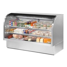 an open refrigerated deli display case with lots of food in it