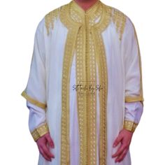 Unsure about sizing? Provide us with your height and weight to ensure a perfect fit for your special moments.                                                           ---------------- Moroccan Jabador for men is a versatile piece perfect for Ramadan, Eid, and as a distinguished nikkah or wedding outfit. This traditional ensemble, reflecting the rich heritage of Moroccan and Islamic wear, is ideal for those seeking elegance and cultural authenticity. Designed as a three-piece set, it seamlessly White Wedding Kaftan For Festive Occasions, White Festive Wedding Kaftan, White Long Sleeve Agbada For Traditional Ceremonies, Traditional White Thobe For Ceremonies, White Traditional Drape Kaftan For Ceremonies, White Kaftan For Traditional Ceremonies, Festive Formal Thobe With Dabka, Festive Formal Thobe With Dabka Detailing, Formal Festive Thobe With Dabka Detailing