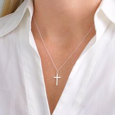 "Sterling Silver Cross Necklace, Religious Jewelry Gift, Womens Christian Faith Medium Cross Pendant, Christmas Cross Gift, Silver Necklace, FREE SHIPPING Simple and modern, this high polished solid 925 sterling silver medium cross pendant has a classic design. OVERVIEW: * Beautiful, elegant, bright and sturdy 14, 16, 18, 20, or 22 inch 925 sterling silver chain. Choose from a 0.7 mm 925 sterling silver box chain, 1 mm petite 925 sterling silver cable link chain, petite 925 sterling silver cable Silver Cross Chain, Cross Necklace Simple, Dainty Cross Necklace, Cross Necklace Women, Cross Necklaces, Silver Cross Necklace, Faith Necklace, Cross Gift, Sterling Silver Cross Necklace