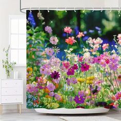 colorful flowers are in the middle of a field shower curtain