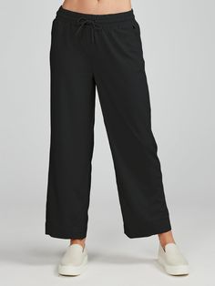 The Weekend Wide Leg Pant is your go-to choice for laid-back days. Crafted from lightweight fabric, it offers optimal comfort and freedom of movement. Its wide leg design ensures a relaxed fit, making it perfect for casual outings and leisurely strolls. With its versatility and effortless style, it's an essential addition to your wardrobe. It's also available with a shorter 22" inseam. Versatile Wide Leg Sweatpants For Everyday, Versatile Wide Leg Sweatpants With Relaxed Fit, Versatile Relaxed Fit Wide Leg Sweatpants, Relaxed Wide-leg Pants For Elevated Casual Occasions, Black Relaxed Fit Effortless Bottoms, Effortless Black Relaxed Fit Bottoms, Black Effortless Bottoms With Relaxed Fit, Versatile Wide Leg Pull-on Pants, Casual Wide Leg Bottoms With 4-way Stretch