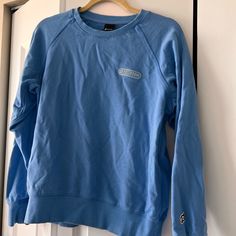 Nwot Peloton Sweatshirt, Size Medium Light Blue Casual Sweatshirt For Sports, Sporty Light Blue Tops With Ribbed Cuffs, Sporty Light Blue Sweatshirt With Relaxed Fit, Light Blue Relaxed Fit Sporty Sweatshirt, Peloton Apparel, Sporty Light Blue Sweatshirt, Relaxed Fit, Color Blue, Size Medium, Sweatshirts Hoodie