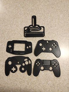 four black nintendo wii game controller parts