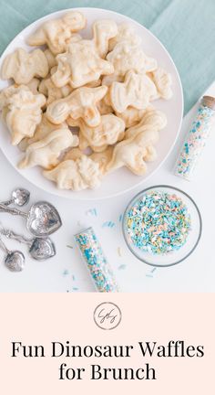 a white plate filled with cookies and sprinkles on top of a table