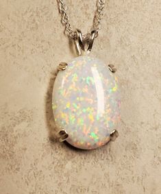 "Large White Lab Created Opal 15x20mm Full Of Rainbow Fire-See Video! There Is More Pink Than Photos Show. Sleek 925 Sterling Silver Pendant With Choice Of Setting Styles, Split Bail, OR Single Dangle (Choose In Drowndown)18\" Sterling Chain Several Chain Length Options to Choose, Message Seller For Availability Of Your Choice. Great Gift! Gift Box Included * I Have An Even Larger One Too! https://www.etsy.com/Cloudrivercreations/listing/1303871722/huge-white-opal-necklace-18x25mm" Rainbow Fire, White Lab, Opal Necklace, White Opal, Large White, Sterling Silver Pendant, Chain Lengths, Chain Length, Sterling Silver Pendants