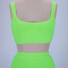 Update your wardrobe with this gorgeous Neon Green 2 Piece Bandage Crop Top and Midi Skirt. Featuring an elegant round neck crop top and a classy bandage matching skirt, perfect for the office or occasional wearing. Team with high heels and a clutch bag. Features: Round Neckline Two-Piece Set Comfortable Fit Fits True To Size Cropped Top Sku: 1649 Made from the best quality bandage material. Crop Top And Midi Skirt, Bandage Crop Top, Round Neck Crop Top, Update Your Wardrobe, Neck Crop Top, Cropped Top, Neon Green, Round Neckline, The Office