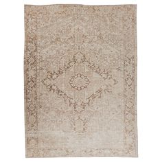 an antique persian rug on white with brown and beige colors, the area is very large