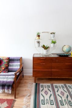 a living room with two couches and a rug