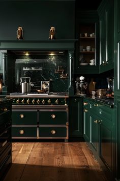 a kitchen with dark green cabinets and wooden floors is lit by lights from the ceiling