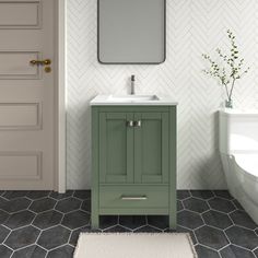 a bathroom vanity with a mirror above it and a rug on the floor next to it