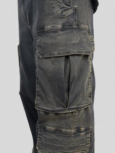 Experience the fusion of functionality and trendsetting design with the Multi Pockets Gradient Jeans. This denim cargo masterpiece boasts a rich washed dark blue hue, contrasted beautifully by the edgy acid wash distressing on the sides. The jeans' most striking feature, two large pockets on both sides, serve a dual purpose - making a bold visual statement while adding practical utility. Further enhancing the uniqueness of these jeans, the waist pockets have been crafted with a multi-layer splic Distressed Denim Cargo Jeans For Streetwear, Grunge Denim Cargo Pants For Streetwear, Blue Washed Cargo Pants For Streetwear, Urban Distressed Denim Cargo Jeans, Washed Black Utility Cargo Jeans, Distressed Medium Wash Cargo Jeans Streetwear, Distressed Medium Wash Cargo Jeans For Streetwear, Medium Wash Distressed Cargo Jeans For Streetwear, Grunge Medium Wash Cargo Jeans For Streetwear