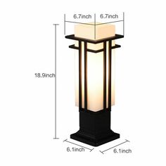 an outdoor post light with measurements