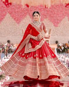 We’re in absolute awe of this gorgeous Sabyasachi bride who shone brightly on her big day in this stunning Sabyasachi Red lehenga. ❤ HMUA : @sejal_savaliya22 & team Bride: @urvashi__patel45 Outfit: @sabyasachiofficial Jewellery: @krsonsjewellers Photographer : @studioreflection.in For more such Sabyasachi lehenga designs , Sabyasachi bridal lehenga designs , red bridal lehenga designs follow @wishnwed #wishnwed #sabyasachi #sabyasachilehenga #redlehenga #bridallehenga #sabyasachired Red Wedding Lehenga, Indian Wedding Lehenga