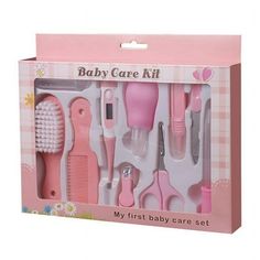 a pink baby care kit in a box