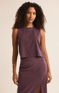 Indulge in the luxurious comfort of the Sloane Jersey Tank Top. Made from a soft, stretchy fabric, this cocoa berry tank top will keep you feeling cozy and stylish. With its crop design, it's perfect for pairing with high-waisted jeans or skirts. Elevate your wardrobe with this must-have piece! Crop Design, Jersey Pants, Jersey Tank Top, Capri Blue, Muscle Tank, Muscle Tanks, Bra Styles, Knit Skirt, Dress Romper