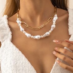 Gleaming with 18k gold-plated metal and baroque pearls, this multi-chain necklace brings layers of charm to your accessory arsenal. Chain 1: 0.27" W x 13.7" L with 2.7" extender Chain 2 : 0.59" W x 8.26" L Lobster claw clasp 18k gold-plated copper / pearl Cuban Link Necklace, Multi Chain Necklace, Friend Jewelry, Copper Pearl, Chain Choker Necklace, Necklace Women, Cuban Link, Layered Necklace, Chain Choker