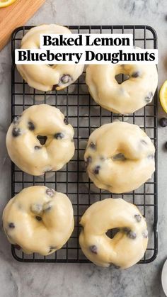 lemon blueberry donuts on a cooling rack