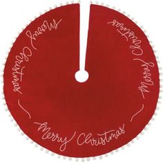 a red christmas tree skirt with writing on it