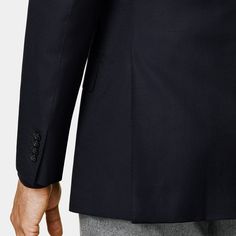 This tailored navy blazer features a relaxed shoulder, classic notch lapel, and flap pockets for a versatile, all-occasion appeal. Navy Outerwear With Double Button Closure And Suit Collar, Classic Navy Outerwear With Concealed Placket, Classic Navy Blazer For Business Casual, Professional Navy Blazer For Workwear, Navy Formal Outerwear With Pockets, Professional Navy Blazer For Formal Occasions, Timeless Navy Blazer For Work, Navy Professional Blazer For Formal Occasions, Professional Navy Blazer For Office