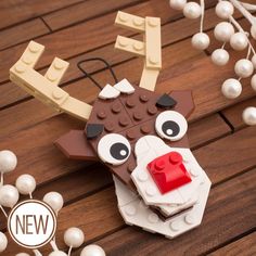 a close up of a lego reindeer head on a table