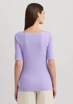 This timeless wardrobe staple is crafted with stretch-infused cotton and features an “LRL” monogram at the hem for a signature Lauren style. Slim fit Intended to hit at the hip Size medium has a 25 body length and an 11.5 sleeve length Body length is taken from the high point of the shoulder Sleeve length changes 0.25 between sizes Boat neck Elbow-length sleeves with folded cuffs Embroidered “LRL” monogram at the right hem Side-split hem Model is 5'10 (178 cm) and wears a size small By choosing Lauren Ralph Lauren's cotton products, you're supporting Lauren Ralph Lauren's investment in the Better Cotton™ mission to help cotton communities survive and thrive while protecting and restoring the environment. This product is sourced via a system of mass balance and therefore may not contain Bet Classic Tops For Spring, Classic Elastane Tops For Spring, Ralph Lauren Fitted Tops For Workwear, Ralph Lauren Fitted Workwear Tops, Fitted Cotton T-shirt By Ralph Lauren, Elegant Short Sleeve Ralph Lauren Tops, Elegant Ralph Lauren Short Sleeve Tops, Fitted Ralph Lauren Cotton T-shirt, Ralph Lauren Fitted Cotton T-shirt