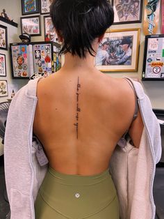 Spine Tattoos For Women About Strength, Quote Tattoo On Spine, Medium Spine Tattoos For Women, Strong And Divine Tattoo, The Sun Will Rise Again Tattoo Spine, Small Spine Tattoos For Women Quote, Feminine Spine Tattoos With Meaning, Still I Rise Spine Tattoo, Spine Tattoos For Women Verses