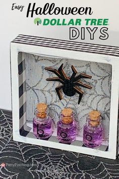 three purple bottles in a white box with spider on the wall behind it and text overlay that says easy halloween dollar tree diys