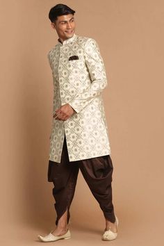 Woven Cream And Copper Color Silk Jacquard Above Knee Length Sherwani, Has A Mandarin Collar, Long Sleeves, Full Front Invisible Button Placket, Straight Hemline, Side Slits, Two Side Pockets, One Welt Pocket And A Pocket Square. Comes With Coffee Color Solid Cowl Dhoti Pant, Has Elasticated Waistband With Drawstring Closure. Product Features: Top Color: Beige Bottom Color: Coffee Top Fabric: Silk Blend Bottom Fabric: Viscose Blend Print And Pattern : Woven Design, Self Design Weave Pattern And Print And Pattern, Mens Sherwani, Sherwani For Men, Lavender Silk, Dhoti Pants, Coffee Color, Beige Top, Weave Pattern, Self Design