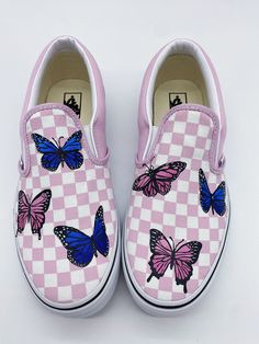 These hand painted Butterfly Vans are great for custom gifts for friends, family, or even yourself. All shoes are painted with high quality fabric paint. This paint is safe to go through the washing machine. Colors may slightly vary from shoe to shoe. Message me or leave comments on which color shoes or butterflies you want! I can do a variety of colors even if they aren't pictures or listed! For sizing questions please refer to the size chart or message me with any questions or concerns. My ave Painted Vans Slip On, Butterfly Vans, Custom Slip On Vans, Custom Vans Shoes, Painted Canvas Shoes, Painted Vans, Purple Paint, Hand Painted Shoes, Colorful Butterfly