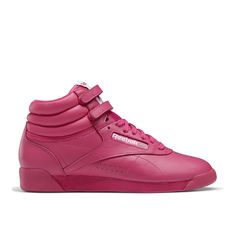 Reebok-Freestyle Hi High-Top Sneaker - Women's You can't go wrong with the retro-inspired Freestyle Hi high-top sneaker from Reebok. Created specifically for women and quickly became a fitness and fashion icon, this pair features a smooth leather upper and a sporty padded collar with hook and loop straps for a secure fit. Reebok Freestyle Hi, Reebok Freestyle, Trending Handbags, Hi Top Sneakers, Mid Top Sneakers, Reebok Shoes, Trending Sneakers, Athleisure Fashion, Mid Top