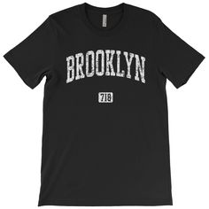 Tired of basic Brooklyn merch? Step up with this vintage-inspired Brooklyn NYC T-shirt, proudly sporting the 718 area code like a true local. Designed for men and unisex wear, this retro athletic-style tee is as laid-back as a Sunday in Prospect Park but way cooler. Crafted from ridiculously soft cotton, it's perfect for those who know that Brooklyn isn't just a borough--it's a lifestyle. Whether you're grabbing coffee at the trendiest café or just dodging overpriced brunch spots, this shirt has your back. Perfect for reminding everyone that Brooklyn is where it's at--because Manhattan's nice and all, but let's be real, 718 runs the city. Wear it, own it, live it--Brooklyn all day. ♥ FREE U.S. SHIPPING ♥ Sizes XS to 4XL ♥ See images for size charts ♥ 100% combed and ring-spun cotton ♥ Heat Brooklyn Shirt Outfits, Brooklyn Jersey Design, Vintage Brooklyn, New York City Sweatshirt, Brooklyn Shirt, Prospect Park, Athletic Style, Brunch Spots, Athletic Fashion