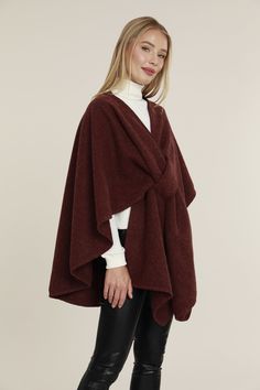 Stay warm in elegant style with our Knit Shawl Wrap. Designed with a pull-through front closure, it boasts a chic asymmetrical silhouette, blending the best elements of a cape, poncho, and shawl. Its soft knit makes it perfect for fall, ensuring you remain both cozy and fashion-forward. Knit wrap Pull-through closure Comes in Beige, Black, Rust, Taupe, Wine, Green, and Navy Hand wash cold and line dry or professional dry clean Item # 75219 Knit Shawl, Knit Wrap, Pull Through, Shawl Wrap, Knitted Shawls, Cool Suits, Soft Knits, Elegant Style, Suits You