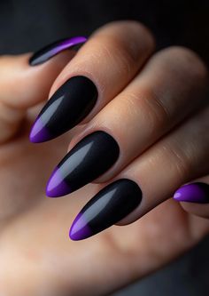 Colors: The nails have a matte black finish with a pop of vibrant purple at the tips. Shape: The nails are long and almond-shaped, with a sharp, pointed tip, giving them a dramatic and edgy look. Design Style: The design is minimalist yet striking, combining the classic elegance of black with the boldness of purple Black And Purple Gel Nails, Dark Purple And Black Nails, Purple And Black Nails, Purple Gel Nails, Concert Nails, Latest Nail Designs