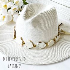 Looking to add some glamour to your hat? This beautiful, hand beaded hat band is fully adjustable for a custom fit for your hat. Made with gorgeous slices of Imperial Jasper gemstone in off white and accented with gold bead spacers!   Suede cording added to back for adjustability. Perfect for added style to your hat!!  It looks great on a cowboy hat or straw hat. Great for a country wedding, too! Hat and props NOT included. Used only for photography purposes.  LISTING IS FOR HATBAND ONLY!! HAT N Luxury Adjustable Hat Bands For Spring, Luxury Hat Bands With Flat Crown For Formal Occasions, Handmade Elegant Hat Bands For The Beach, Handmade Elegant Hat Bands For Beach, Elegant Handmade Hat Bands For Beach, Handmade Elegant Wide Brim Hat Bands, Elegant Handmade Adjustable Fedora, Adjustable Beaded Fedora Hat Band, Adjustable Western Style Summer Jewelry