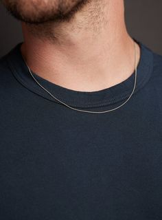 Waterproof Sweatproof Men's Necklace - 1mm thin and minimalist tube like snake chain for guys - 316L Stainless steel no rust no turn jewelry Chain width: 1mm Clasp: Lobster Claw Chain: Waterproof 316L Stainless Steel Length: Available in 16, 18. 20, 22, and 24. Model is wearing 20 inch chain. Note that depending on your height, build, shoulders and neck chain will fit you different. Please measure your ideal length before ordering. Build Shoulders, Mens Silver Jewelry, Miami Cuban Link Chain, Jewelry Styles, Snake Chain Necklace, Sterling Silver Cross Pendant, Mens Silver Necklace, Jewelry Chain, Silver Cross Pendant