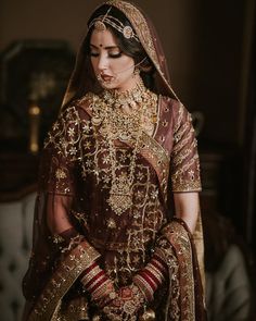 a woman in a bridal gown and veil