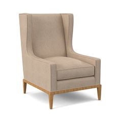 an upholstered beige chair with wooden legs