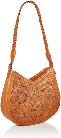 Meet the Sonoma, a stunning and roomy tooled leather cross body with beautiful braided strap.  Exquisite craftsmanship and detailing.  The design of each bag is hand drawn and hand tooled into the leather over ten steps.  Large Hobo shaped crossbody, but not slouchy.  Part of the Mauzari signature line which is our highest quality production.  Thick leather, high quality hardware and construction means the bag will last for years. Color Guide:  In this listing the brown option refers to our "Hon Traditional Leather Bag With Woven Details, Traditional Woven Leather Bag, Traditional Brown Hobo Bag With Adjustable Strap, Hand Tooled Leather Crossbody Shoulder Bag, Leather Bohemian Shoulder Bag, Bohemian Leather Shoulder Bag, Leather Hobo Shoulder Bag With Braided Handles, Leather Crossbody Hobo Bag With Braided Handles, Traditional Woven Leather Shoulder Bag For Daily Use