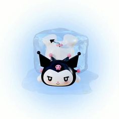 an ice block with two little animals on it's back and one is upside down