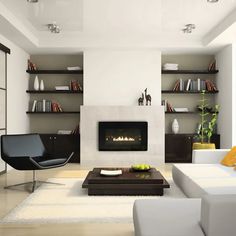 a modern living room with white furniture and a fire place in the fireplace, along with bookshelves