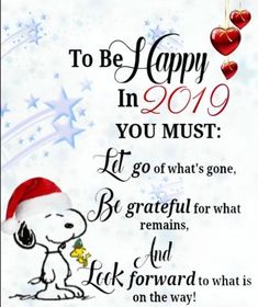 a happy new year greeting card with snoopy